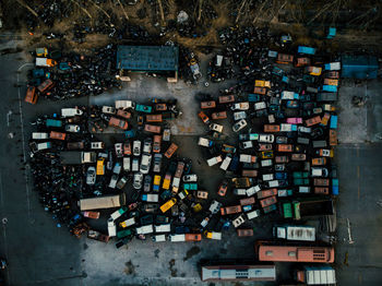 Aerial view of vehicles parked in parking lot