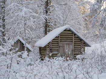 Old croft in the forest in winter time