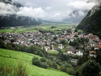 Aerial view of townscape against sky