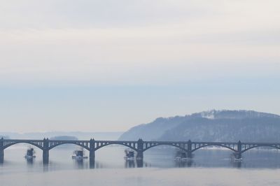 Side view of bridge over calm sea