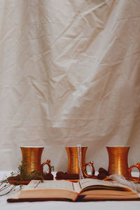 Close-up of book on table at home