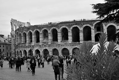 Group of people in front of historical building