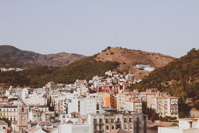 High angle shot of townscape against clear sky