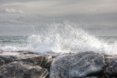 Waves splashing on rocks