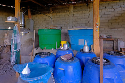 View of blue garbage bin