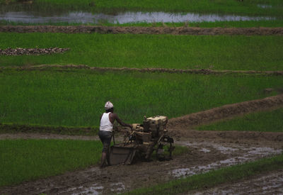 Man working on agricultural field