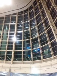 Low angle view of illuminated building against sky at night