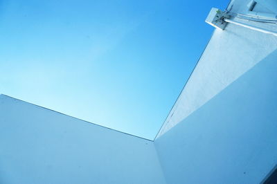 Low angle view of building against blue sky