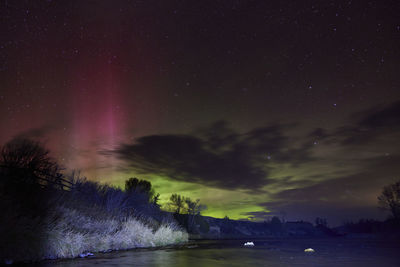 Aurora borealis in ennis montana at burnt tree access on the madison river.