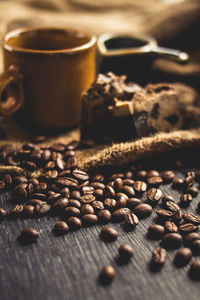 Close-up of coffee beans on table