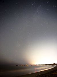 Scenic view of star field against sky at night