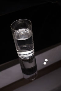 Close-up of wineglass on table