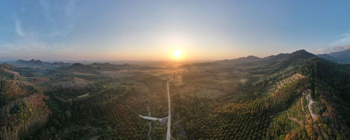 Scenic view of landscape against sky during sunset