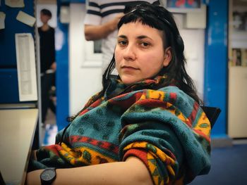 Portrait of woman sitting in train