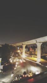 Light trails on city street at night