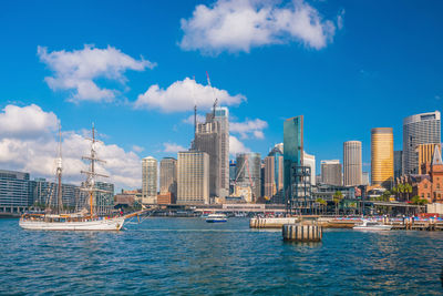 Modern buildings in city against sky