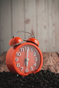 Close-up of clock on wall