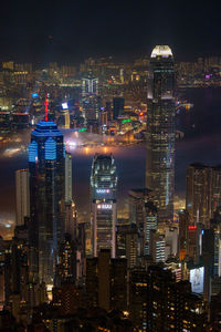 Illuminated buildings in city at night