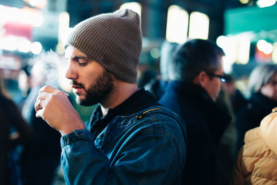 Guy drinking a hot wine during winter eyeemnewhere