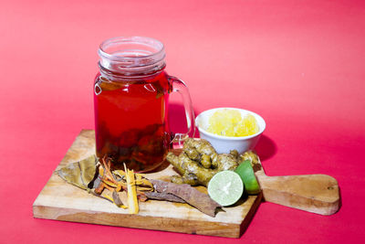 Close-up of drink in glass jar on table