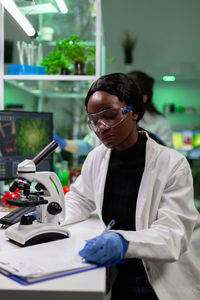 Female scientist working in laboratory