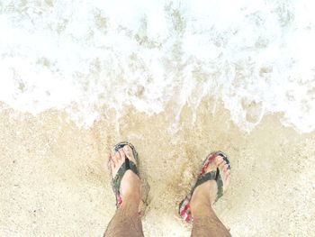 Low section of man at beach