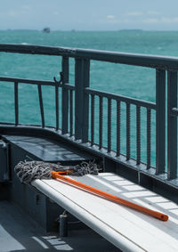 Mop on bench at pier