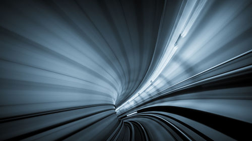 Blurred motion of illuminated tunnel