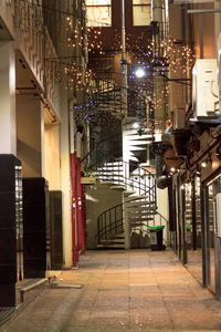 Illuminated building in city at night