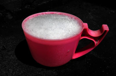 Close-up of coffee cup on table