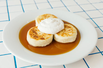 Close-up of dessert in plate on table