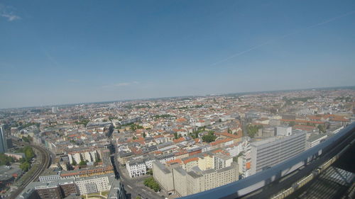 High angle view of buildings in city against clear sky