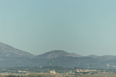 Scenic view of mountains against clear sky