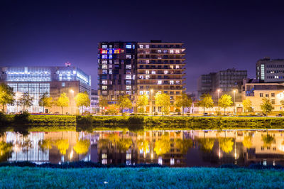 View of city lit up at night