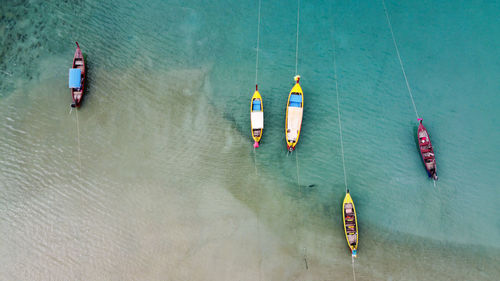 High angle view of people on boat in sea