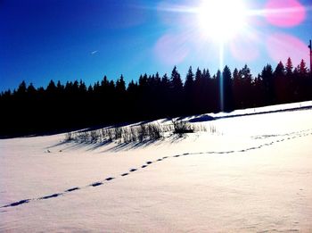 Scenic view of snow covered landscape