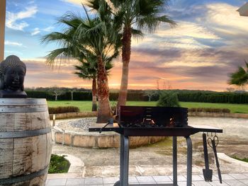 Empty road against cloudy sky