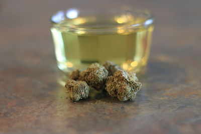 Close-up of glass of jar on table