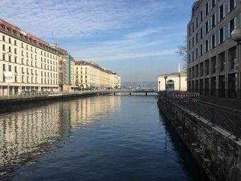 View of buildings in city against sky