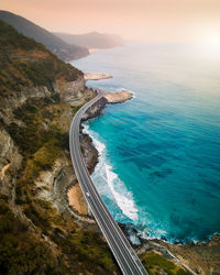 Aerial view of bridge by sea