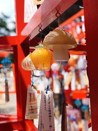 Close-up of lantern hanging in temple