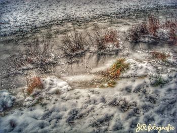 High angle view of snow covered land