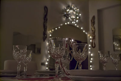 Candles on glass table at home