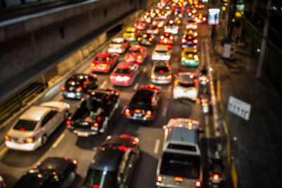 Blurred on purpose photograph of heavy traffic during the evening rush hour.