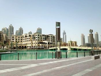 Bridge over river against clear sky