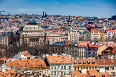 National theatre building and prague city old town seen from petrin hill in an early spring day