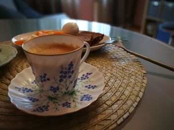 Close-up of coffee cup on table