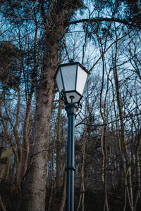 Low angle view of street light against sky