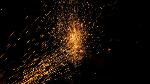 Firework display at night