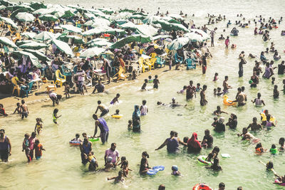 High angle view of people on water